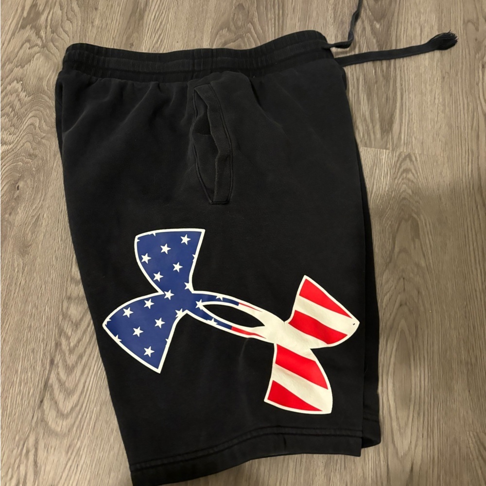 Under armour shirts, black red and blue, size youth medium